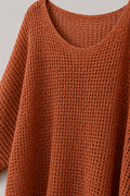 Detalle de tejido calado y lurex plateado del Sweater Lurex Batwing terracota